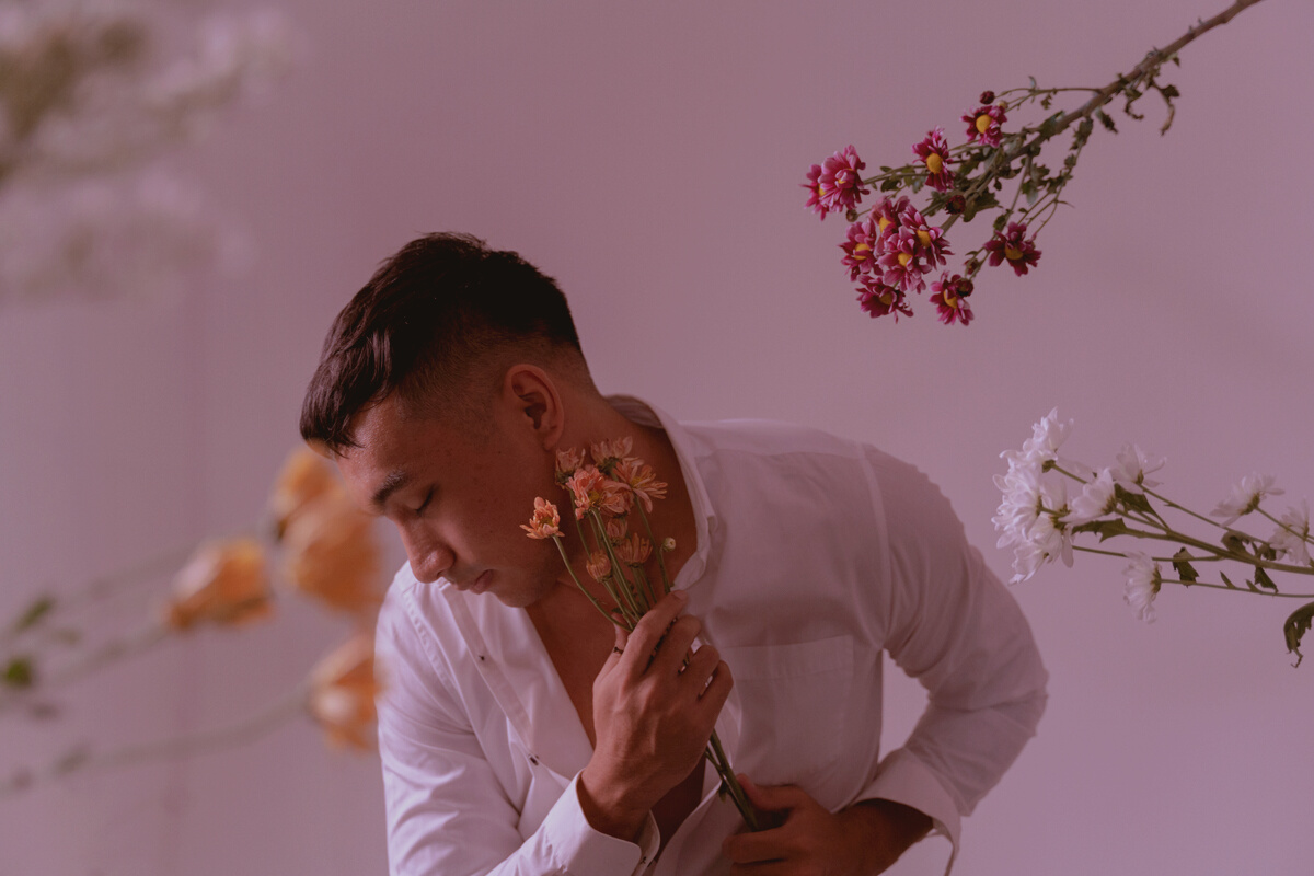 Man Hugging Flowers